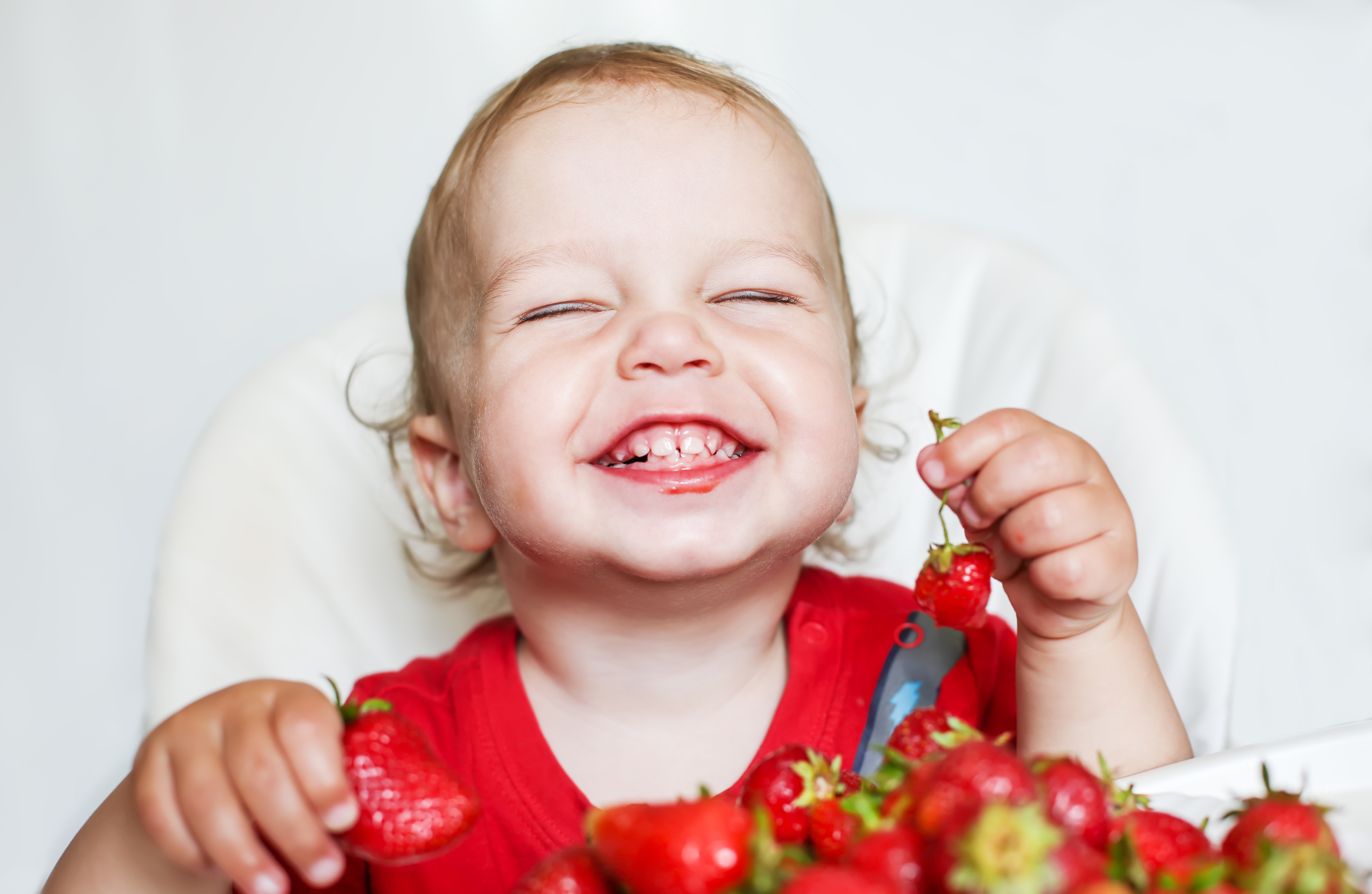 bigstock-happy-toddler-boy-eating-straw-65789122.jpg